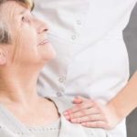 Senior Receiving Personal Care From A Nurse